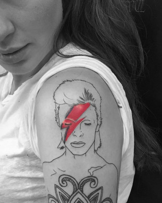 Ireland Baldwin Shows Off New David Bowie Shoulder Tattoo at NY Fashion Week
