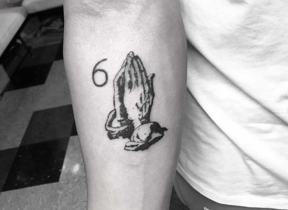 Drake “Levels Up” Praying Hands Tattoo and Adds New Compass Ink- PopStarTats