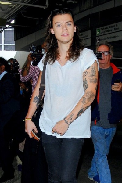 Harry Styles Covers Up “Things I Can” Arm Tattoo with New Eagle Ink