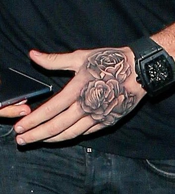 liam payne roses hand tattoo