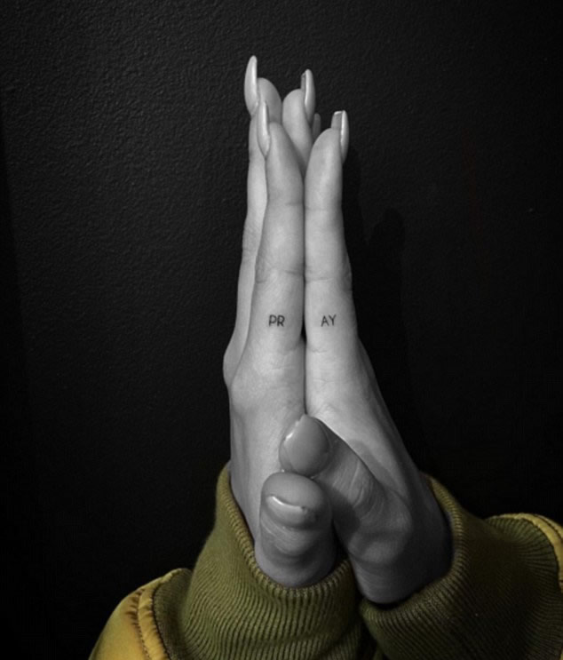 Hailey Baldwin Back at it Again With a New “Pray” Hands Tattoo Designed by Kendall Jenner- PopStarTats