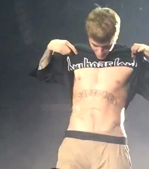 Justin Bieber's New Abdomen Tattoo Brands Him a “Son of God”- PopStarTats