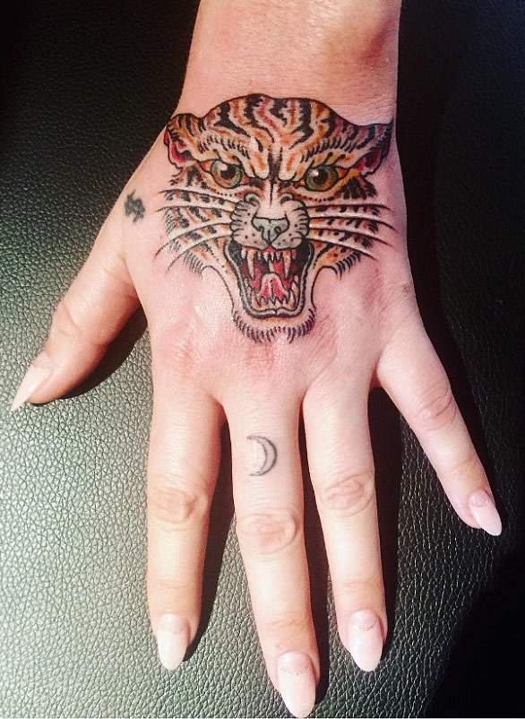 Kesha Shows Off New Tiger Hand Tattoo on Instagram- PopStarTats