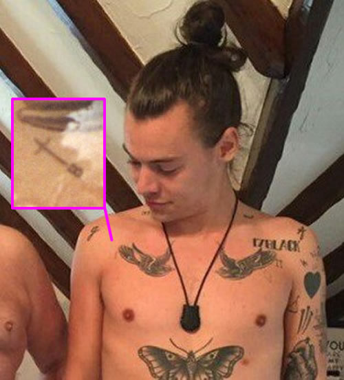 Harry Styles Shows Off Tiny Cross and Letter “B” Tattoo on His Chest