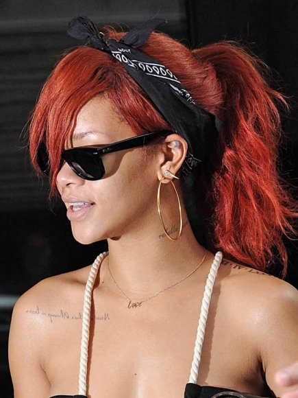 Rihanna Shows Off Tattoos and Red Hair in a Sexy Black Dress