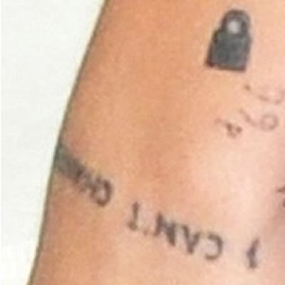 Harry Styles’ “I Can’t Change” Tattoo
