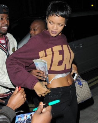 Rihanna Gets a New Tattoo on Her Chest / Stomach For Grandma