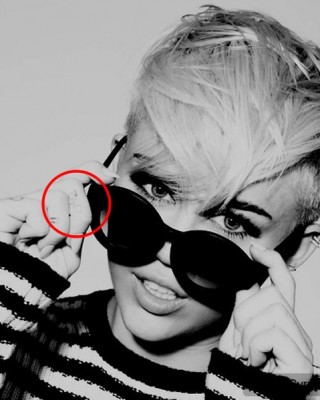 New Photo Shoot Confirms Miley’s “BAD” Finger Tat is Real
