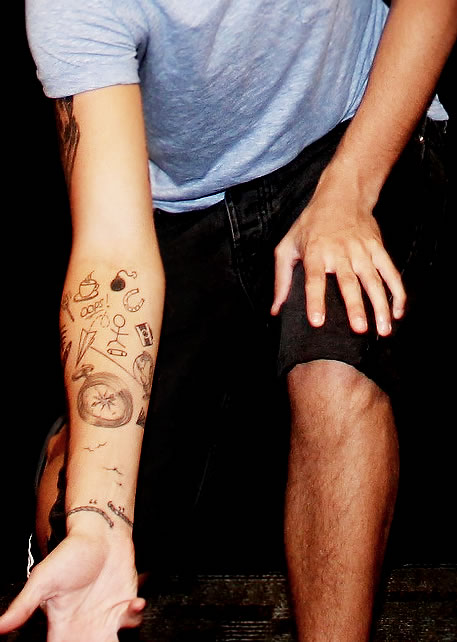 Louis Tomlinson’s Half Sleeve Arm Tattoos