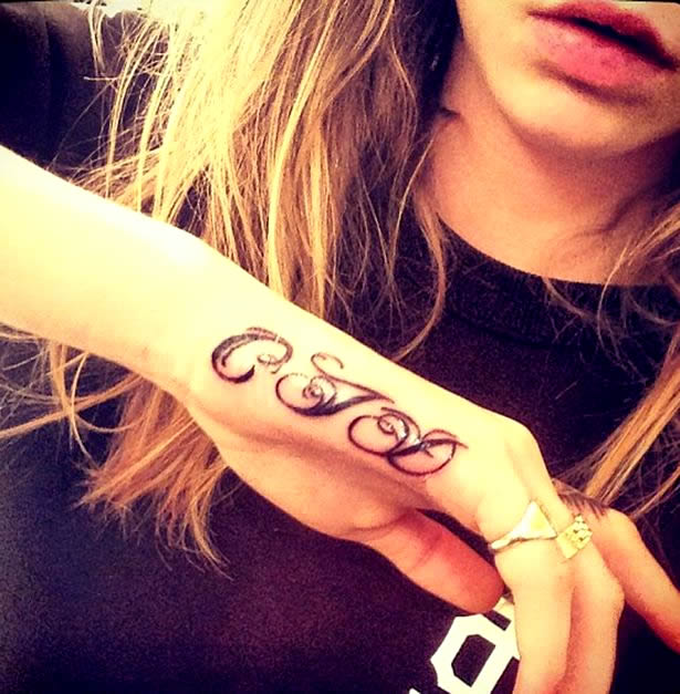 Cara Delevingne’s “CJD” Initials Tattoo on Her Hand