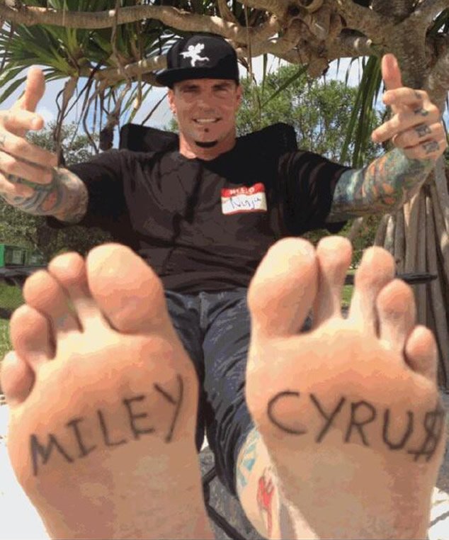 Vanilla Ice Shows Off Hilarious (and Fake) “Miley Cyrus” Foot Tattoos