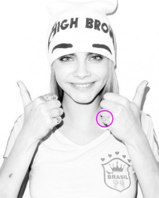 Cara Delevingne’s Red Heart Tattoo on Her Finger