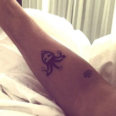 Justin Bieber Gets a Jester Tattoo as House-Egging Charges Loom