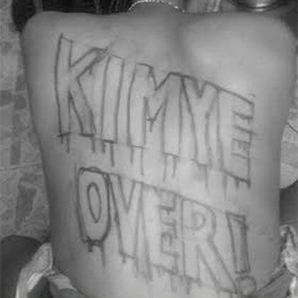 Kanye West Fan Gets Crazy Huge “KIMYE OVER!” Back Tattoo