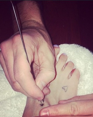 Ke$ha Starts 2014 Off on the Right Foot With New Smiley Face Tattoo