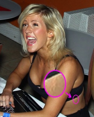 Ellie Goulding’s Mysterious “J” Tattoo on Her Side