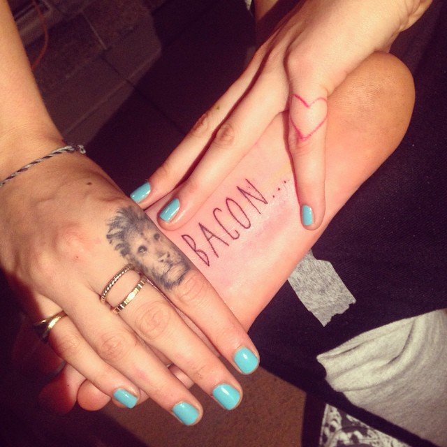 Cara Delevingne Follows Through With “Bacon…” Foot Tattoo
