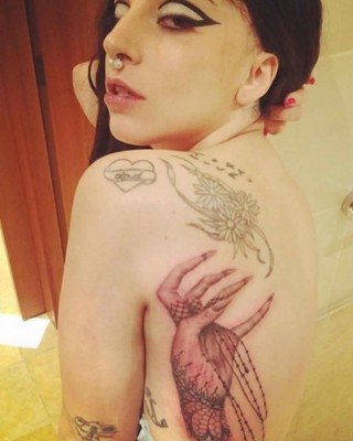 Lady Gaga Gets “Monster Paw” Tattoo Tribute to Her Little Monsters