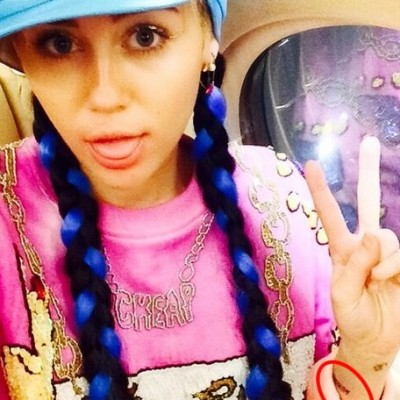 Miley Cyrus Marks Melbourne Arrival With New Wrist “Wukong” Tattoo Dedicated to Brother Braison