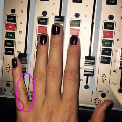 Cara Delevingne’s New “AC” Finger Tattoo Sparks St. Vincent Dating Rumors
