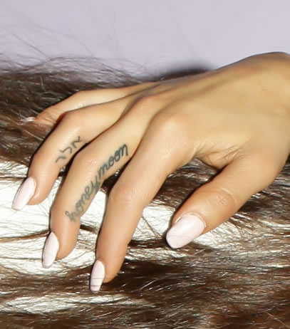 Ariana Grande Shows Off TWO New Finger Tattoos on Tour!