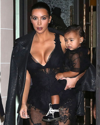 Kim Kardashian May be Planning a Tribute Tattoo to Daughter North on Her Breasts