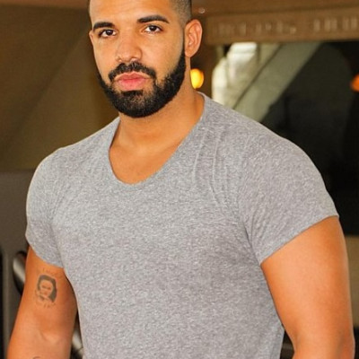 Drake’s Mysterious Arm Tattoo May be a Portrait of Rihanna