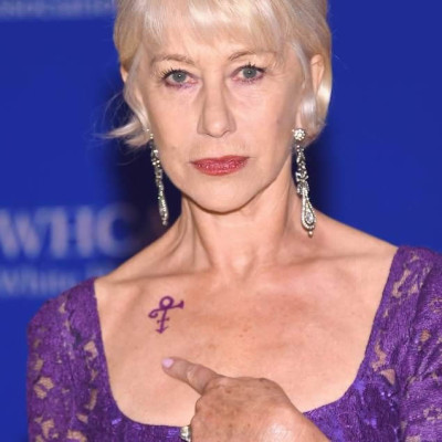 Helen Mirren Dons Purple Dress and Faux Prince Tribute Tattoo at White House Correspondents’ Dinner