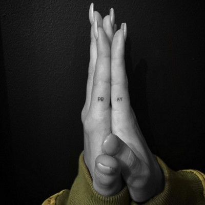 Hailey Baldwin Back at it Again With a New “Pray” Hands Tattoo Designed by Kendall Jenner