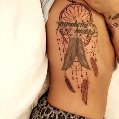 Demi Lovato Adds to “You Make Me Beautiful” Ribcage Tat with New Dreamcatcher Ink