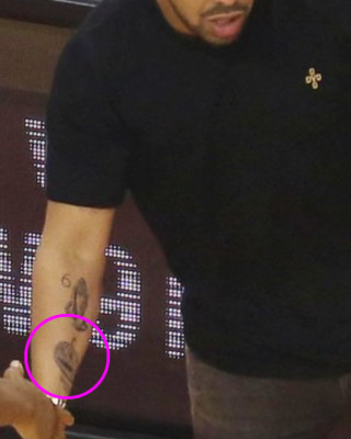 Drake’s Jack-O-Lantern-Style Pumpkin Tattoo on His Right Arm