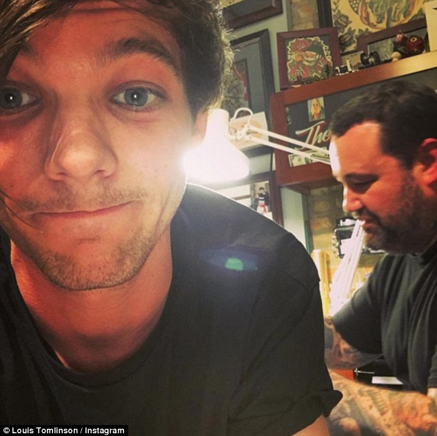 Louis Tomlinson Confirms the Tattoo on His Butt is of a Penguin Wearing Headphones